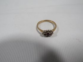 A HALLMARKED 9CT GOLD DRESS RING