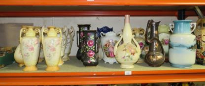A LARGE COLLECTION OF DECORATIVE VASES TO INCLUDE TWIN HANDLE VASES