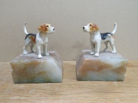 A PAIR OF FOX HOUNDS ON MARBLE BASES