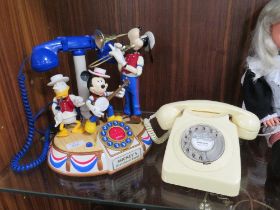 A VINTAGE DISNEY MICKEY'S DIXIE LAND BAND AUTOMATON MUSICAL TELEPHONE TOGETHER WITH A VINTAGE BELL