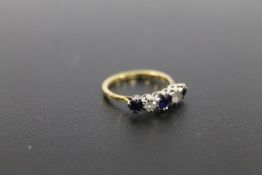 AN 18CT GOLD FIVE STONE SAPPHIRE AND DIAMOND RING approx weight 2.3g
