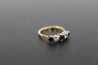 AN 18CT GOLD FIVE STONE SAPPHIRE AND DIAMOND RING approx weight 2.3g