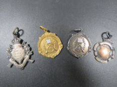 THREE HALLMARKED SILVER WATCH FOBS TOGETHER WITH ANOTHER