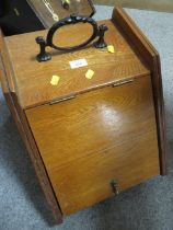 A VINTAGE OAK COAL SCUTTLE