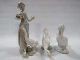 LLADRO LADY AND GOOSE FIGURINE A/F (LADY HAS FINGER MISSING) TOGETHER WITH TWO NAO GOOSE FIGURINE (