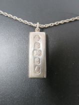 A MENS VINTAGE 1oz SILVER INGOT ON A SILVER CHAIN