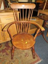 AN ANTIQUE STICKBACK ARMCHAIR