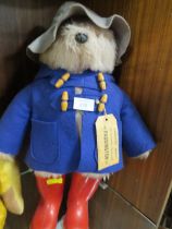 A VINTAGE PADDINGTON BEAR WITH TAG AND DUNLOP BOOTS APPROX HEIGHT 50CM