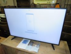 A SAMSUNG 42" FLATSCREEN TV WITH REMOTE, CABLE AND MANUAL
