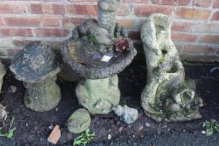 THREE CONCRETE GARDEN STATUES / ORNAMENTS TO INCLUDE A BIRD BATH, A MUSHROOM AND A WATER FEATURE