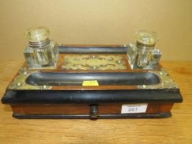 A VINTAGE BRASS BOUND DESK TIDY WITH INKWELLS AND DRAWER