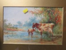 A GILT FRAMED AND GLAZED WATERCOLOUR OF CATTLE IN A STREAM SIGNED LOWER RIGHT 18 X 29 CM