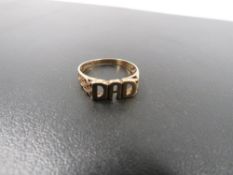 A HALLMARKED 9 CARAT GOLD "DAD" RING approx weight 2g