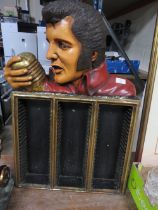 AN ELVIS WOODEN CD RACK