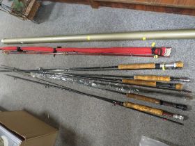 A SELECTION OF VINTAGE FISHING RODS