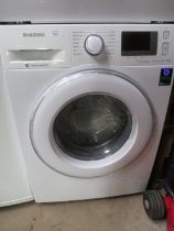 A SAMSUNG ECO BUBBLE WASHING MACHINE