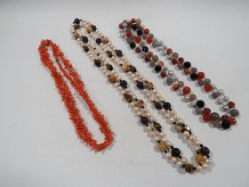 TWO VINTAGE PEARL AND HARDSTONE NECKLACES & A RED STICK CORAL EXAMPLE