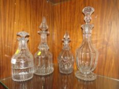 A COLLECTION OF GEORGIAN CUT GLASS DECANTERS