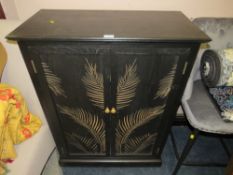 A MODERN TWO DOOR CUPBOARD WITH INCISED LEAF DETAIL - W 80 cm