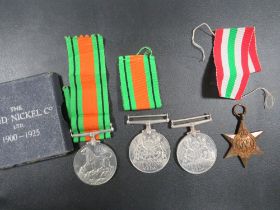 A SMALL BAG OF ASSORTED MEDALS