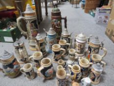 A LARGE TRAY OF COLLECTABLE BEER STEINS