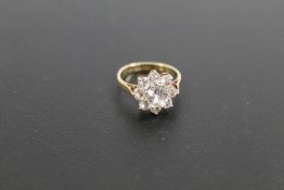 A HALLMARKED 9 CARAT GOLD CZ CLUSTER RING approx weight 2.9g