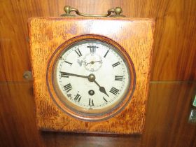 A VINTAGE CASED PIGEON CLOCK