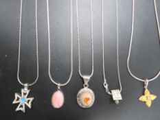 FIVE MODERN SILVER AND OTHER PENDANTS ON CHAINS
