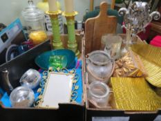 TWO TRAYS OF ASSORTED DECORATIVE HOUSEHOLD ITEMS TO INCLUDE CANDLE HOLDERS, COOK BOOK STAND ETC