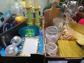TWO TRAYS OF ASSORTED DECORATIVE HOUSEHOLD ITEMS TO INCLUDE CANDLE HOLDERS, COOK BOOK STAND ETC