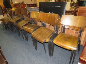 A QUANTITY OF INDUSTRIAL STYLE STACKING CHAIRS
