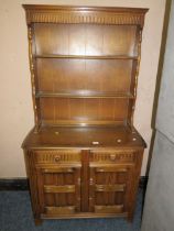 A SMALL OAK DRESSER