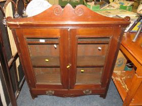 AN EDWARDIAN MAHOGANY GLAZED BOOKCASE