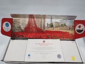 A BOXED PAUL CUMMINS CERAMICS REMEMBRANCE DAY POPPY