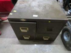 A VINTAGE FOUR DRAWER TABLE TOP FILING CABINET