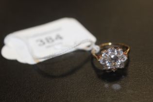 A HALLMARKED 9 CARAT GOLD CZ CLUSTER RING approx weight 2.9g