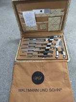 A CASED WALTMANN UND SOHN KITCHEN KNIFE SET POSSIBLY UNUSED