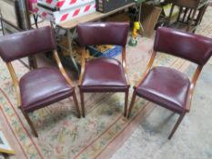 THREE VINTAGE LEATHERETTE AND BEECH WOOD CHAIRS