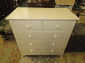 A MODERN WHITE FIVE DRAWER CHEST