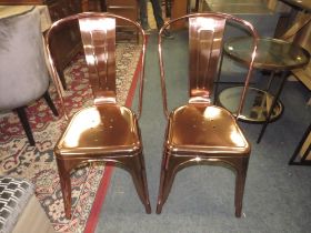 A PAIR OF INDUSTRIAL STYLE METAL CHAIRS