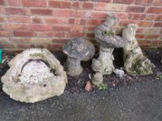 THREE CONCRETE GARDEN STATUES / ORNAMENTS TO INCLUDE A BIRD BATH, A MUSHROOM AND A WATER FEATURE ETC