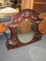 AN EDWARDIAN MAHOGANY OVERMANTLE MIRROR