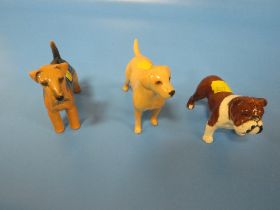 THREE SMALL BESWICK DOGS