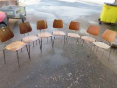 A SELECTION OF SEVEN STACKING INDUSTRIAL STYLE CHAIRS