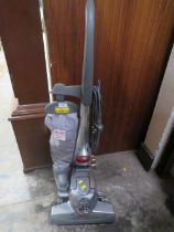 A KIRBY UPRIGHT VACUUM CLEANER