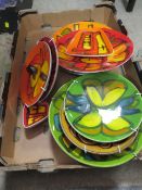 A TRAY OF RETRO POOLE POTTERY PLATES AND DISHES