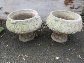 A PAIR OF CONCRETE PLANTERS