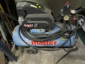 AN AIR MASTER COMPRESSOR