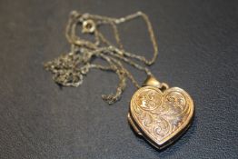 A "LOVE YOU ALWAYS" HEART SHAPE LOCKET ON A FINE CHAIN STAMPED 375 approx weight of chain 0.5g