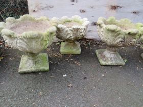 THREE CONCRETE PLANTERS